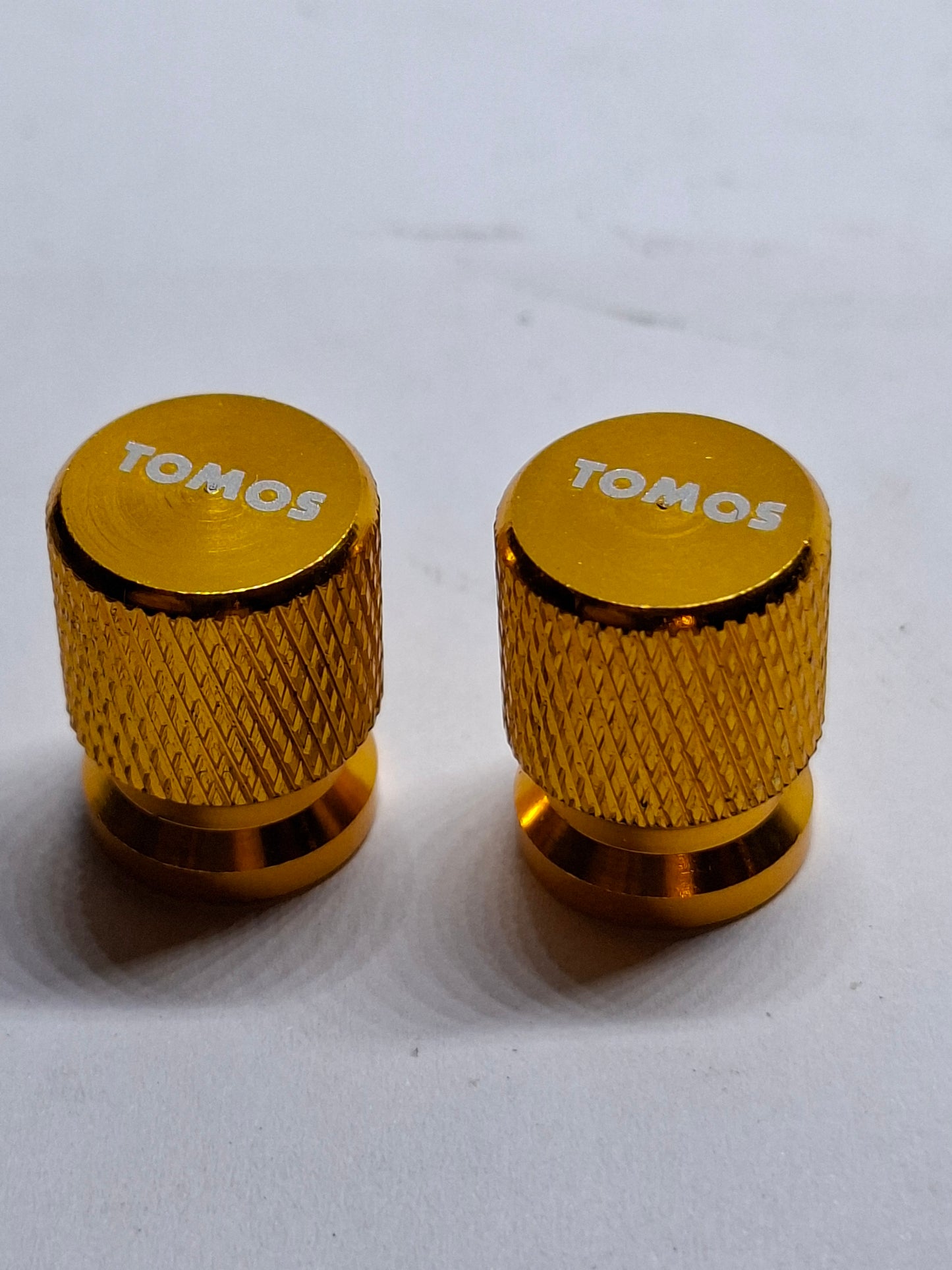 Ventieldopset goud Tomos