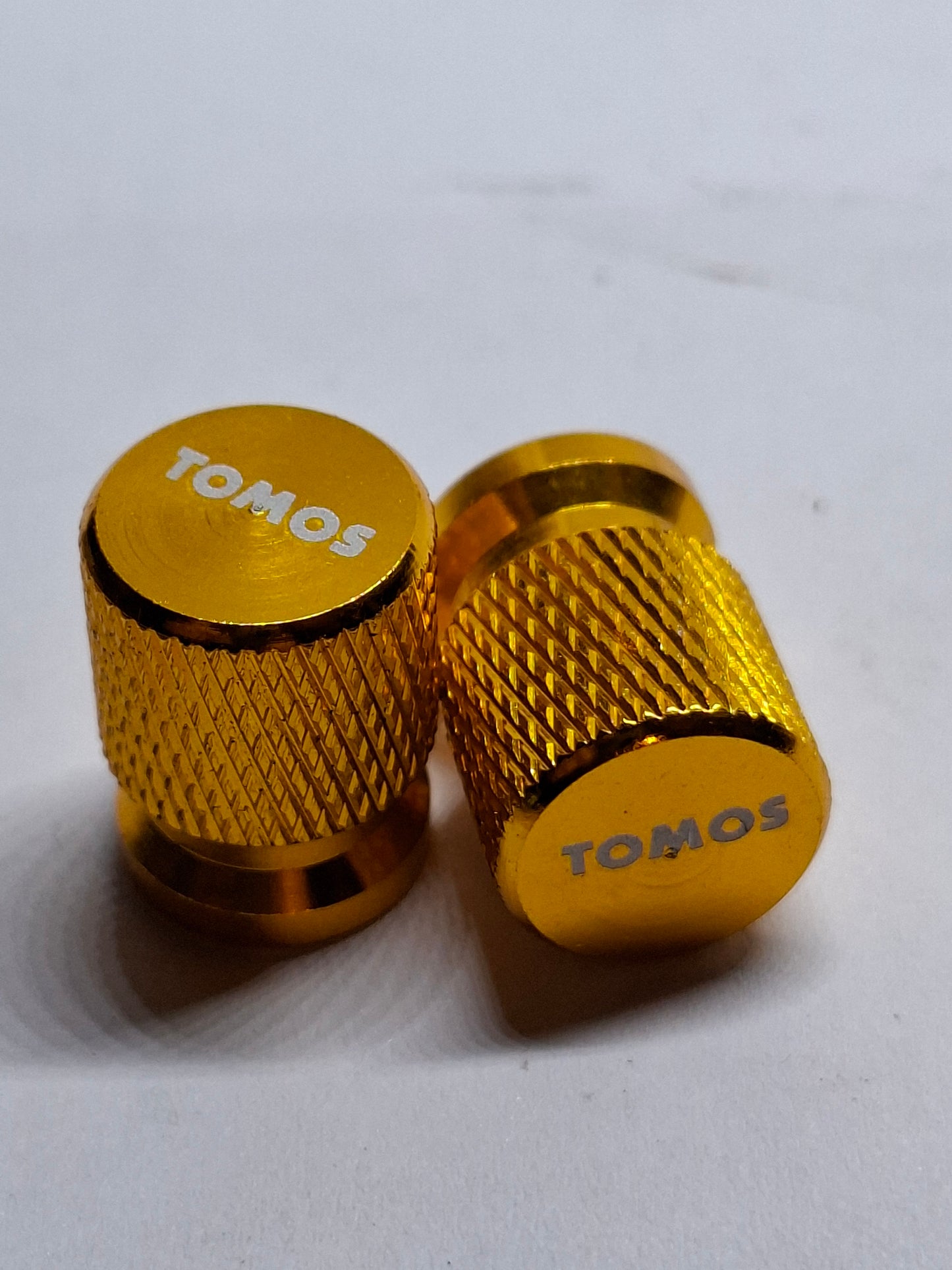 Ventieldopset goud Tomos