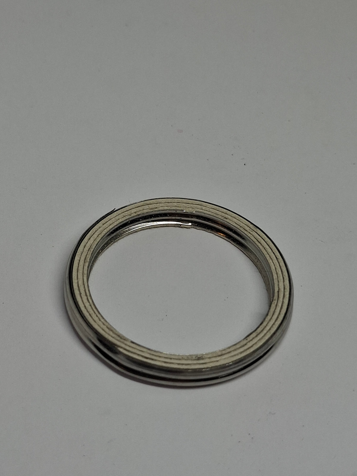 Uitlaatpakking / Uitlaatring 27 x 33 x 4 mm – Geschikt voor o.a. Wallaroo, Vivacity, Buxy, Fox, Bali & Kymco